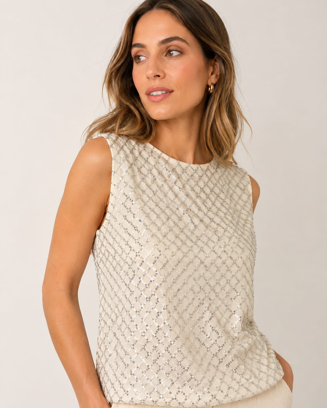 BLUSA CON LENTEJUELAS